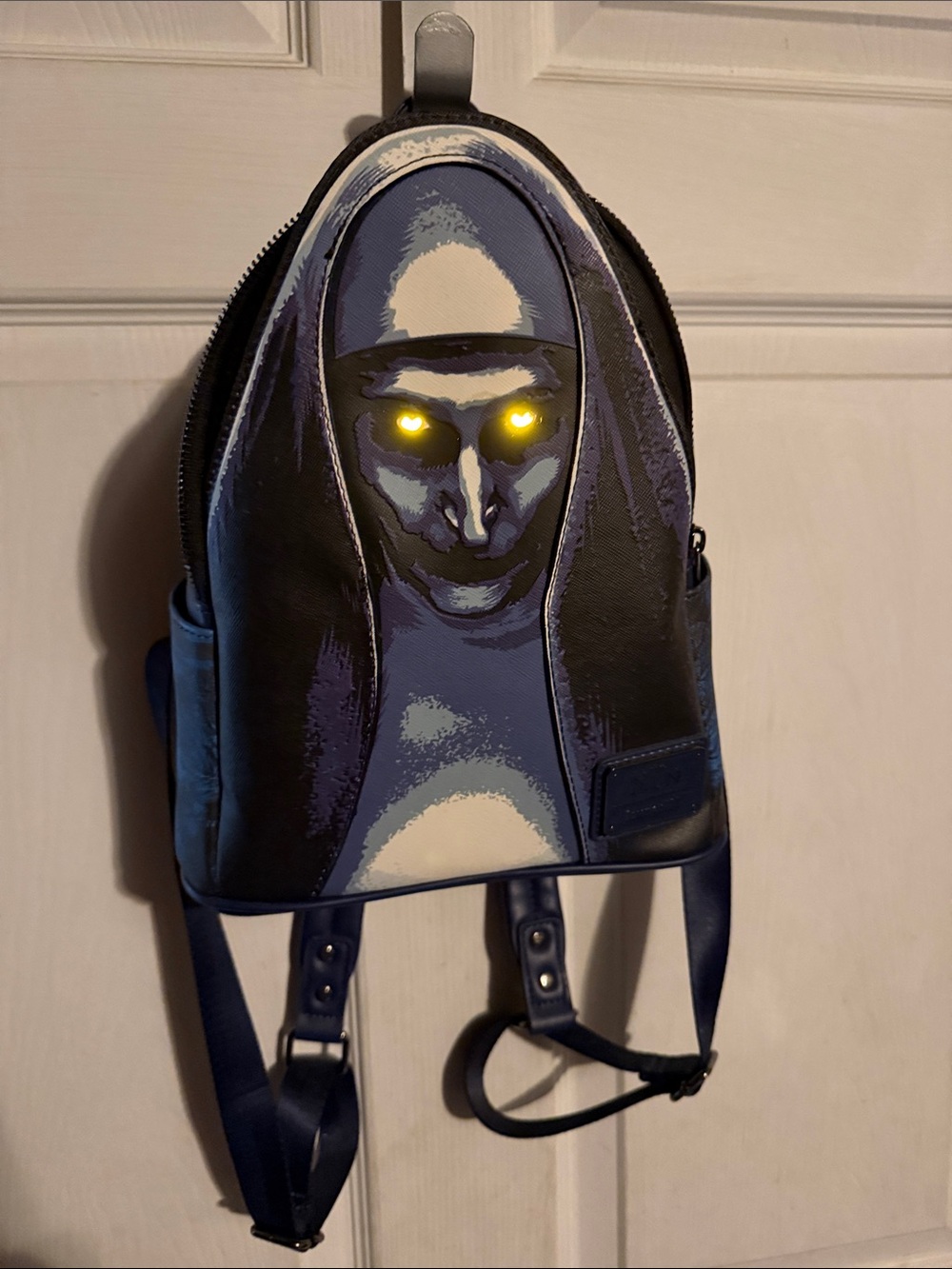 Loungefly The Nun backpack. The eyes light up!